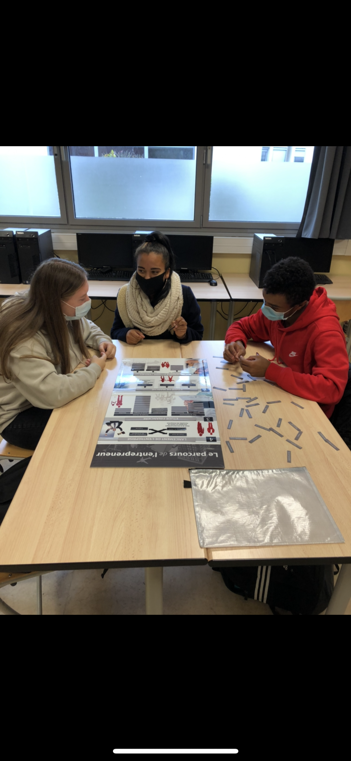 Young people round a table